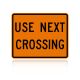 MUTCD W10-14AP Use Next Crossing (plaque)
